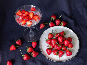 High angle view of strawberries on table