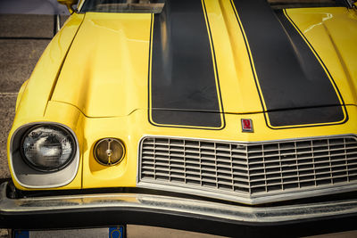 Close-up of yellow car