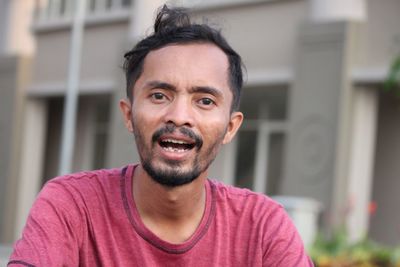 Portrait of mid adult man outdoors