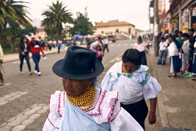 People on street in city