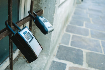 Close-up of padlock on railing