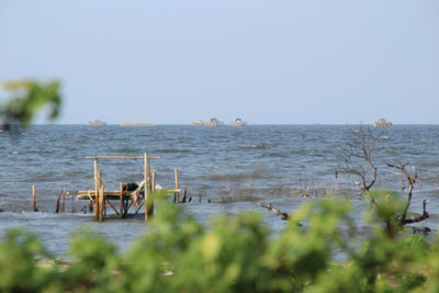 Scenic view of sea against clear sky