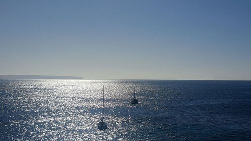 Scenic view of sea against clear sky