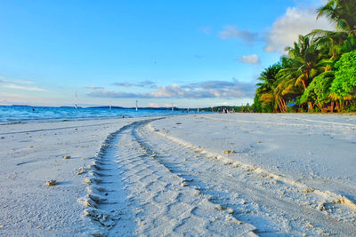 Scenic view of beach against sky