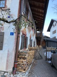 View of wooden house against building