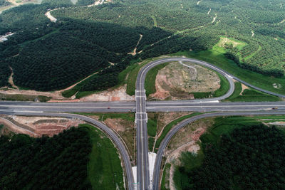 High angle view of highway on field in city