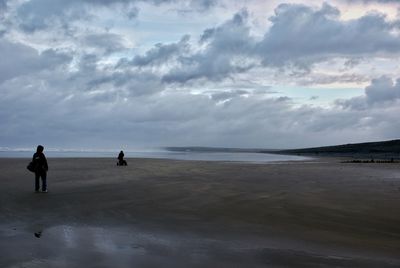 Scenic view of sea against dramatic sky