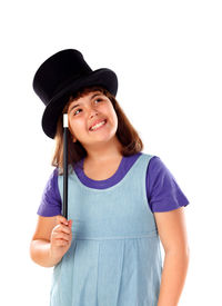 Portrait of smiling girl standing against white background