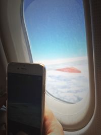 Airplane flying over sea