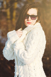 Portrait of young woman in snow