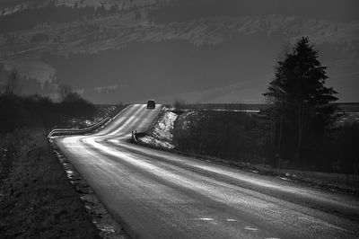 Light trails on road at night