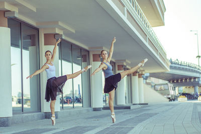 People in front of building