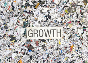 High angle view of information sign on garbage