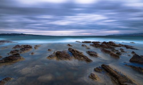 Scenic view of beach against sky