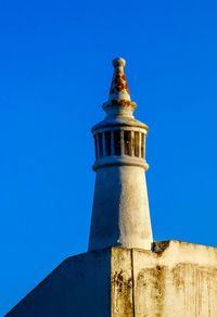 Low angle view of lighthouse against sky