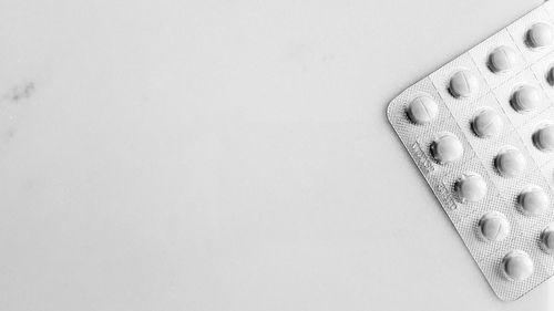 Close-up of table against white background