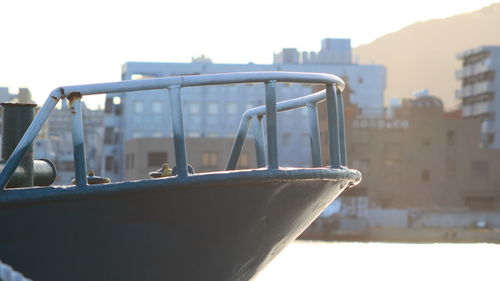 Close-up of railing against clear sky