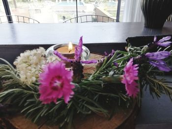 Close-up of pink flowers on table