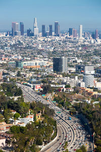 High angle view of street amidst buildings in city