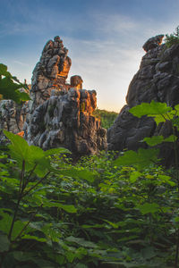 Low angle view of rocks against sky