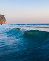 Beautiful wave curling in the big surf of bali, indonesia