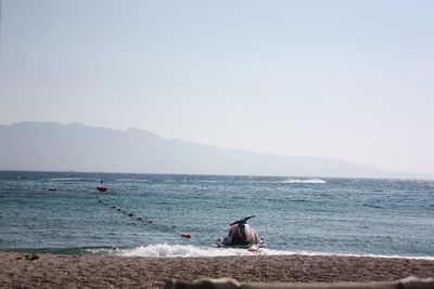 Scenic view of sea against clear sky