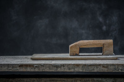 Wooden trowel on table