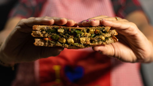 Close-up of woman holding food