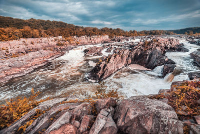 Panoramic view of rocks against sky