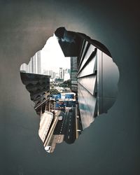 High angle view of man standing at waterfront