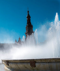 Blurred motion of fountain at plaza de espana