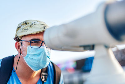 Portrait of man wearing mask