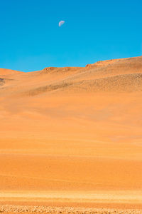 Moon over the altiplano, high andean plateau, atacama desert, chile, south america