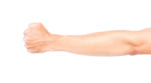 Close-up of human hand against white background