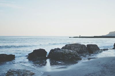 Scenic view of sea against clear sky