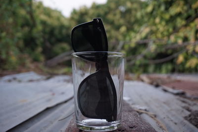 Close-up of drinking glass on table