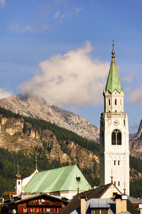 Church at cortina d ampezzo against sky