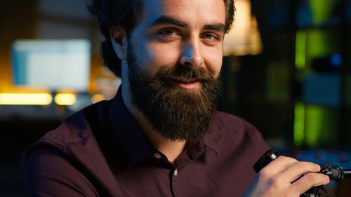 Portrait of young man looking away