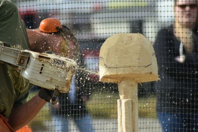 Artist carving wood