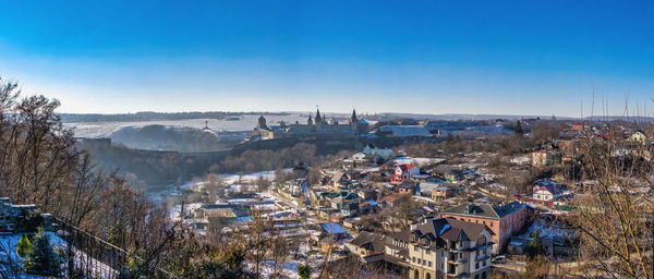 Panoramic view of the kamianets-podilskyi fortress on a sunny winter morning