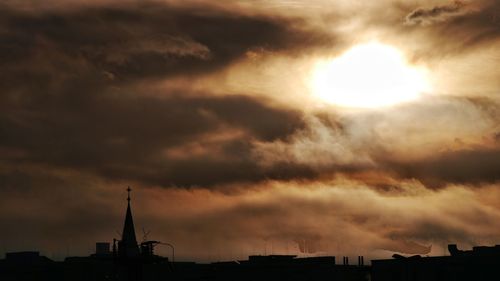 Low angle view of dramatic sky during sunset