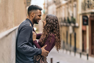 Side view of couple kissing