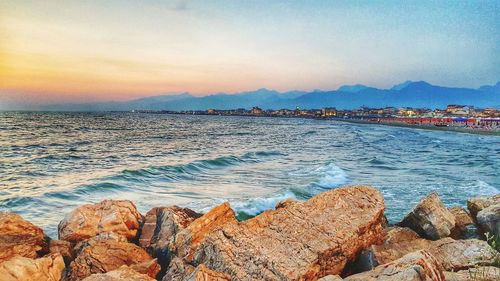 Scenic view of sea against sky during sunset