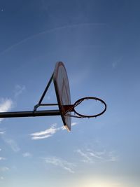 Low angle view of basketball hoop against sky