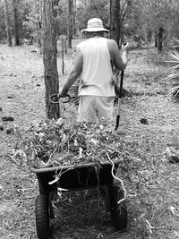 Rear view of man on field