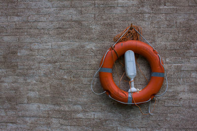 Close-up of rope hanging on wall