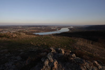 Scenic view of river against clear sky