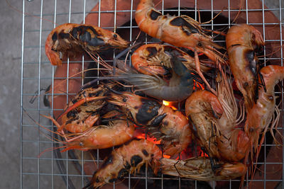 Close-up of meat on barbecue grill