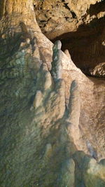 Close-up of rock formation in water