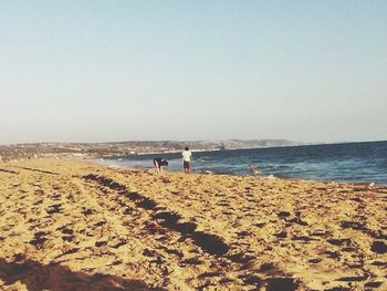 Scenic view of sea against clear sky